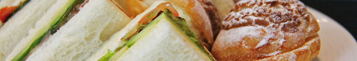Eating Sandwich at Smiling Moose Deli restaurant in Fargo, ND.